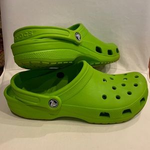 CROCS mens 8 womens 10.  Min wear some stains on bottom as u can see in pic.